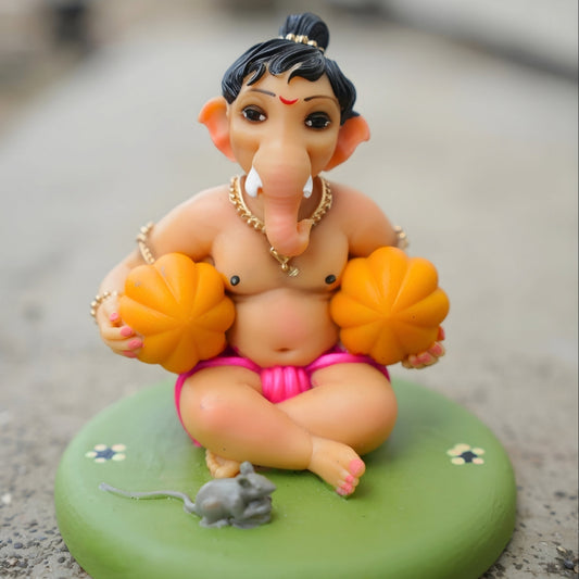 Bal Ganesh holding modak, 4 inch handcrafted Ganpati murti